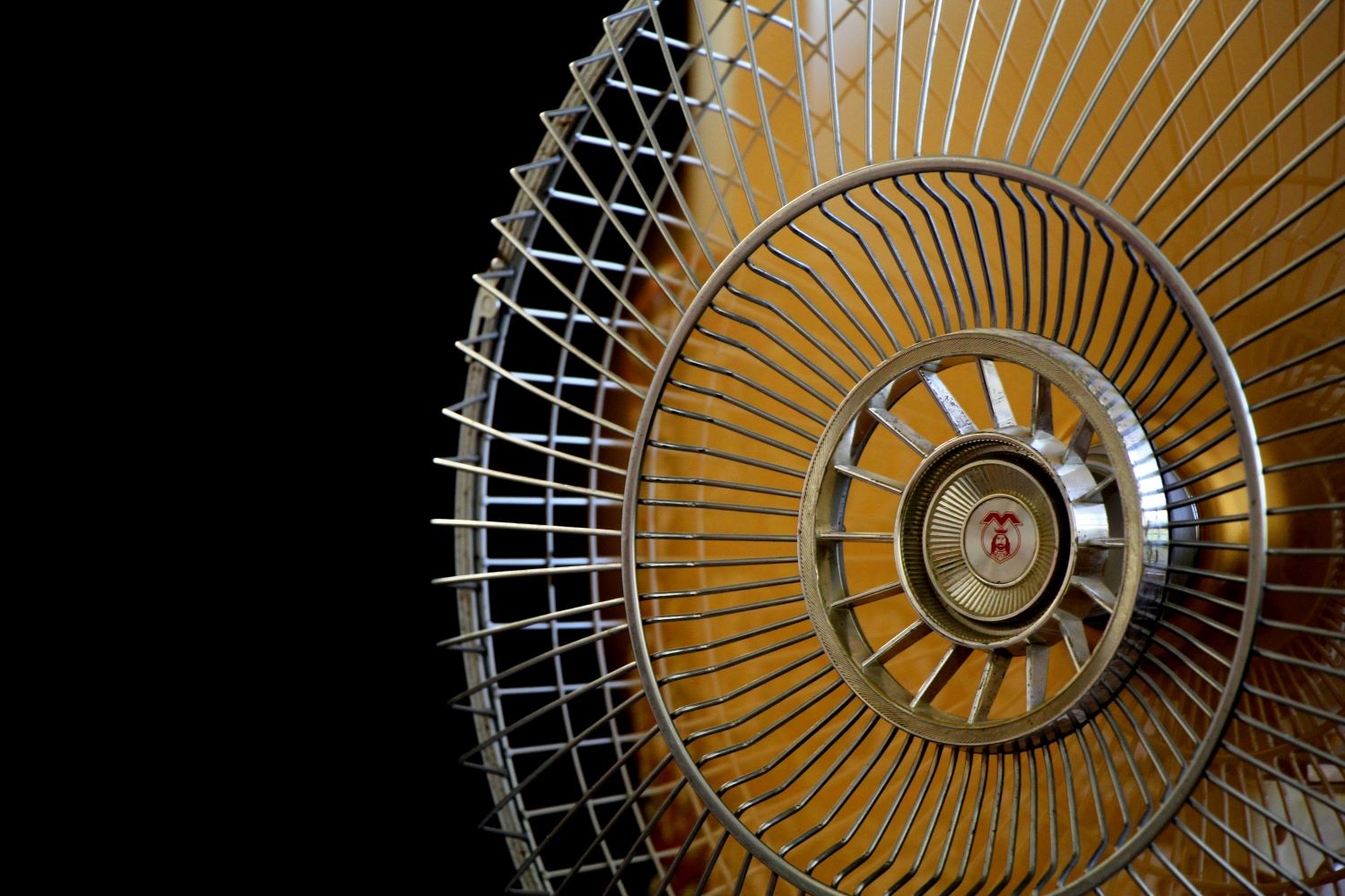 Fan behind a black background